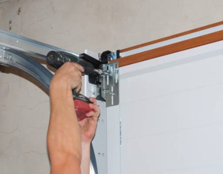 garage doors Repairman repair garage door opener. Garage door replacement, garage door repair.