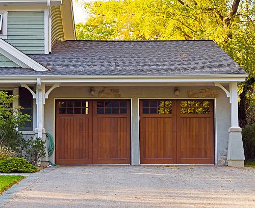Two wooden car garage residence