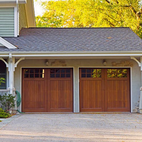 Two wooden car garage residence